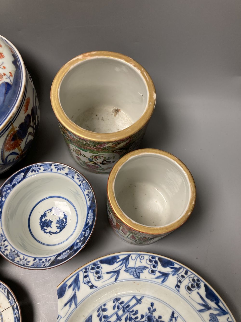 Two 19th century Chinese famille rose brushpots, and other Chinese and Japanese porcelain items, 18th-20th century